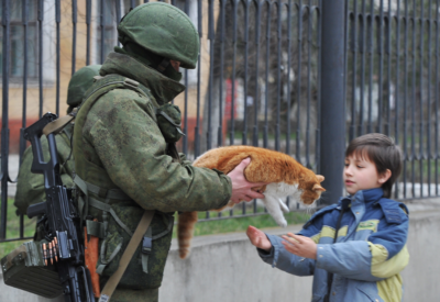 Russian Soldier with Cat (Source: Gazeta.ru)