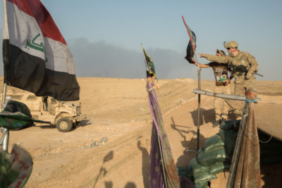 U.S. Soldiers conduct a key leader engagement at Qayyarah West Airfield